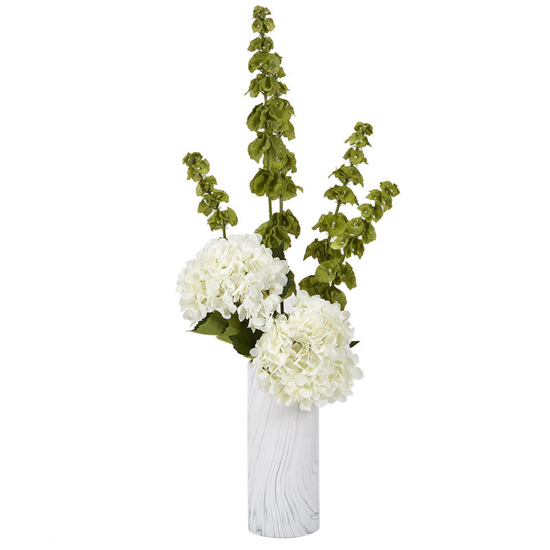 CREAM HYDRANGEAS AND BELLS OF IRELAND IN MARBLED CERAMIC VASE